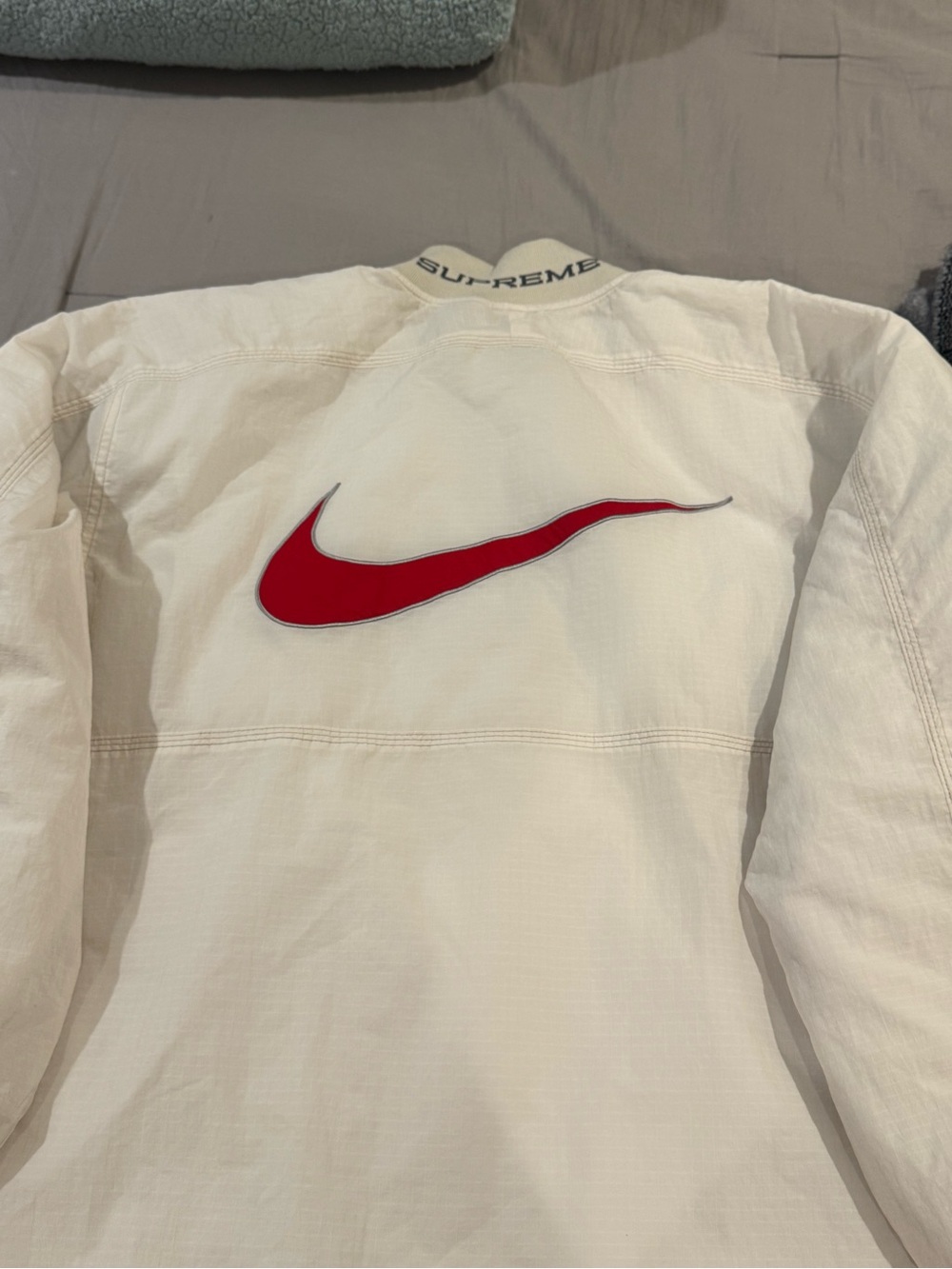 Nike supreme Cream Bomber Jacket with Red Swoosh